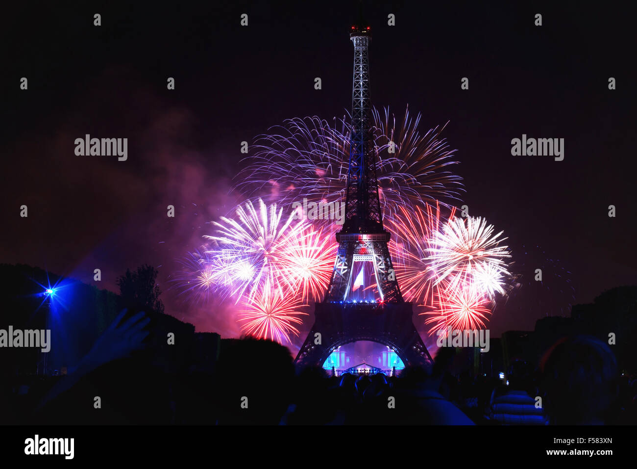 night scene of fireworks at Eiffel Tower in Bastille Day, National Day of France, July 14, 2013 in Paris France Stock Photo