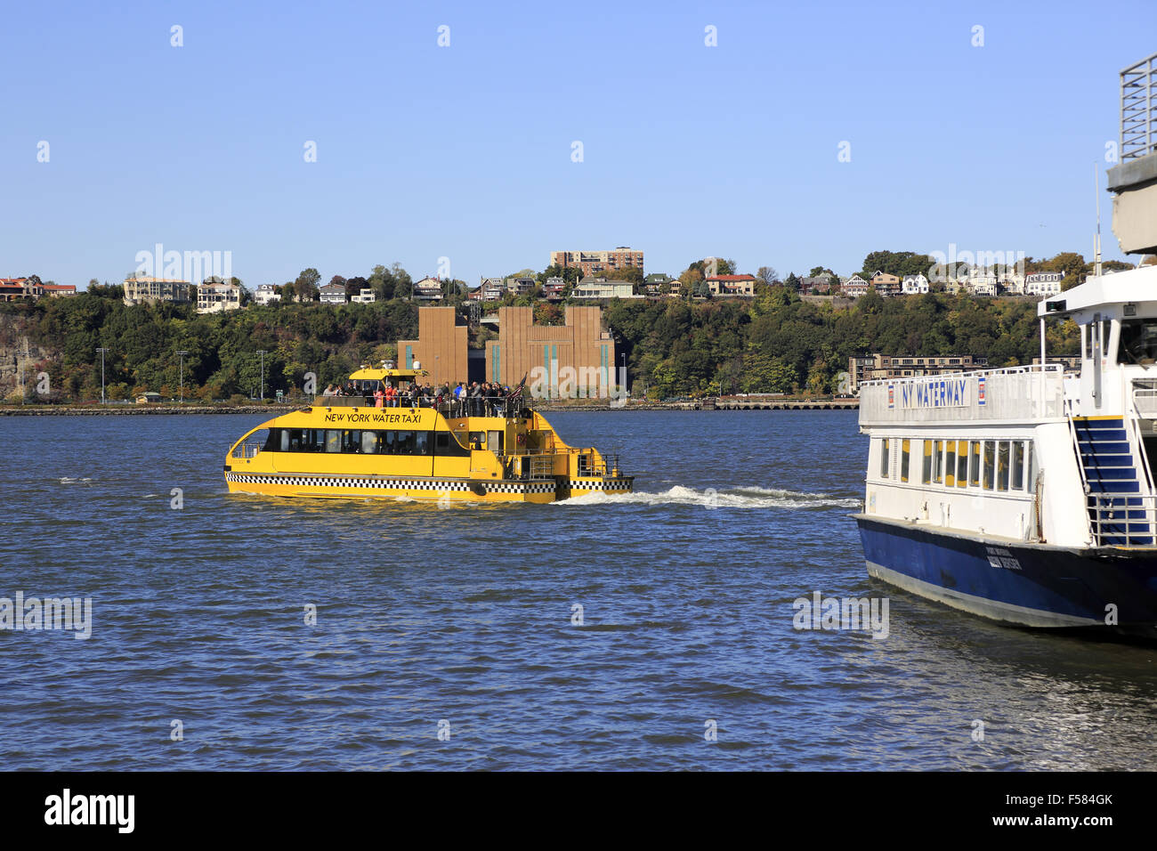 New York Water Taxi in Hudson River with land of New Jersey in the  background. West side of Manhattan, New York City. USA Stock Photo - Alamy