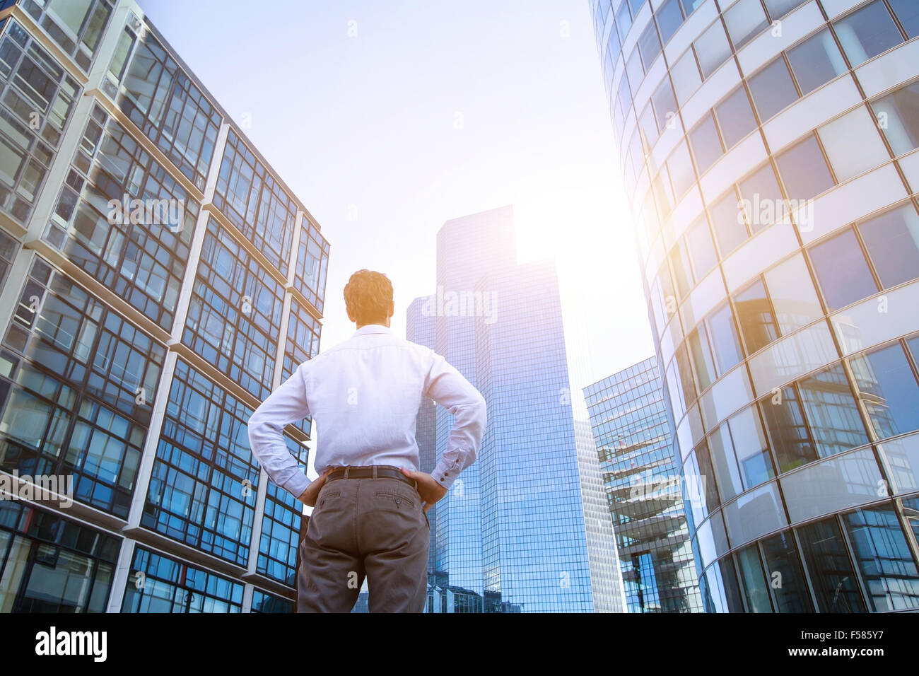 career concept, business background, man looking at office buildings Stock Photo