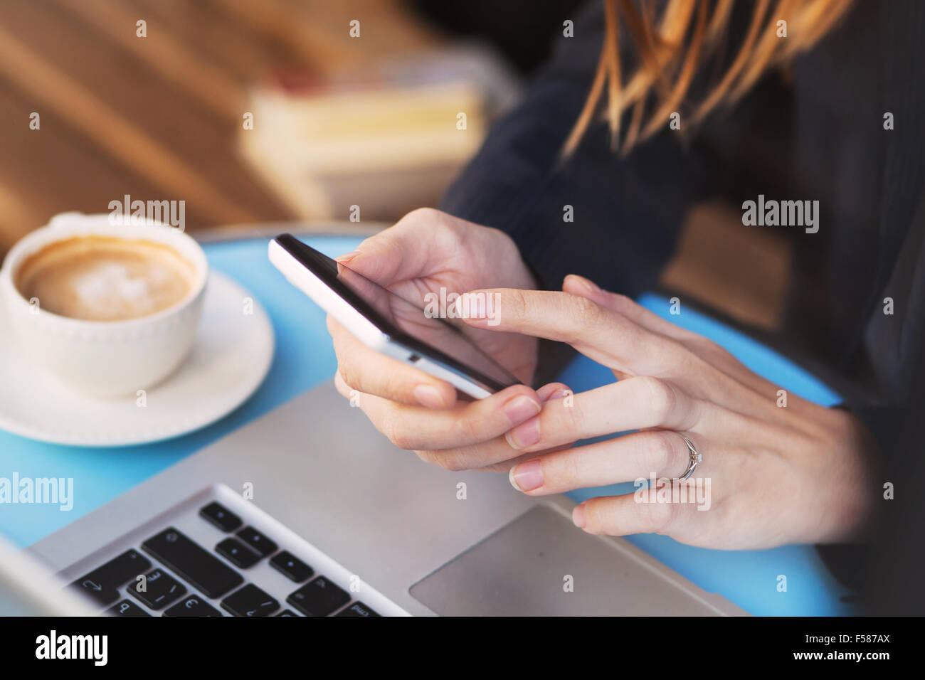 mobile internet, wifi connection on smartphone in cafe Stock Photo