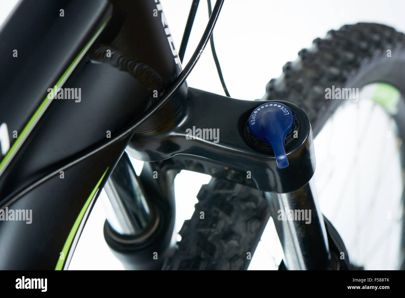 closeup of lever of lockable shock absorber of mountain bike (MTB), on a white background Stock Photo