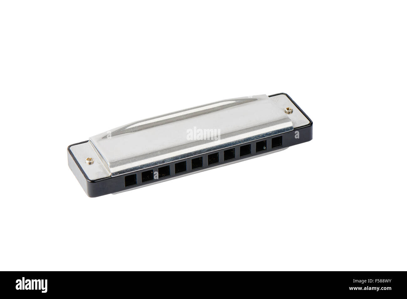 used small harmonica made from steel and plastic, isolated on white