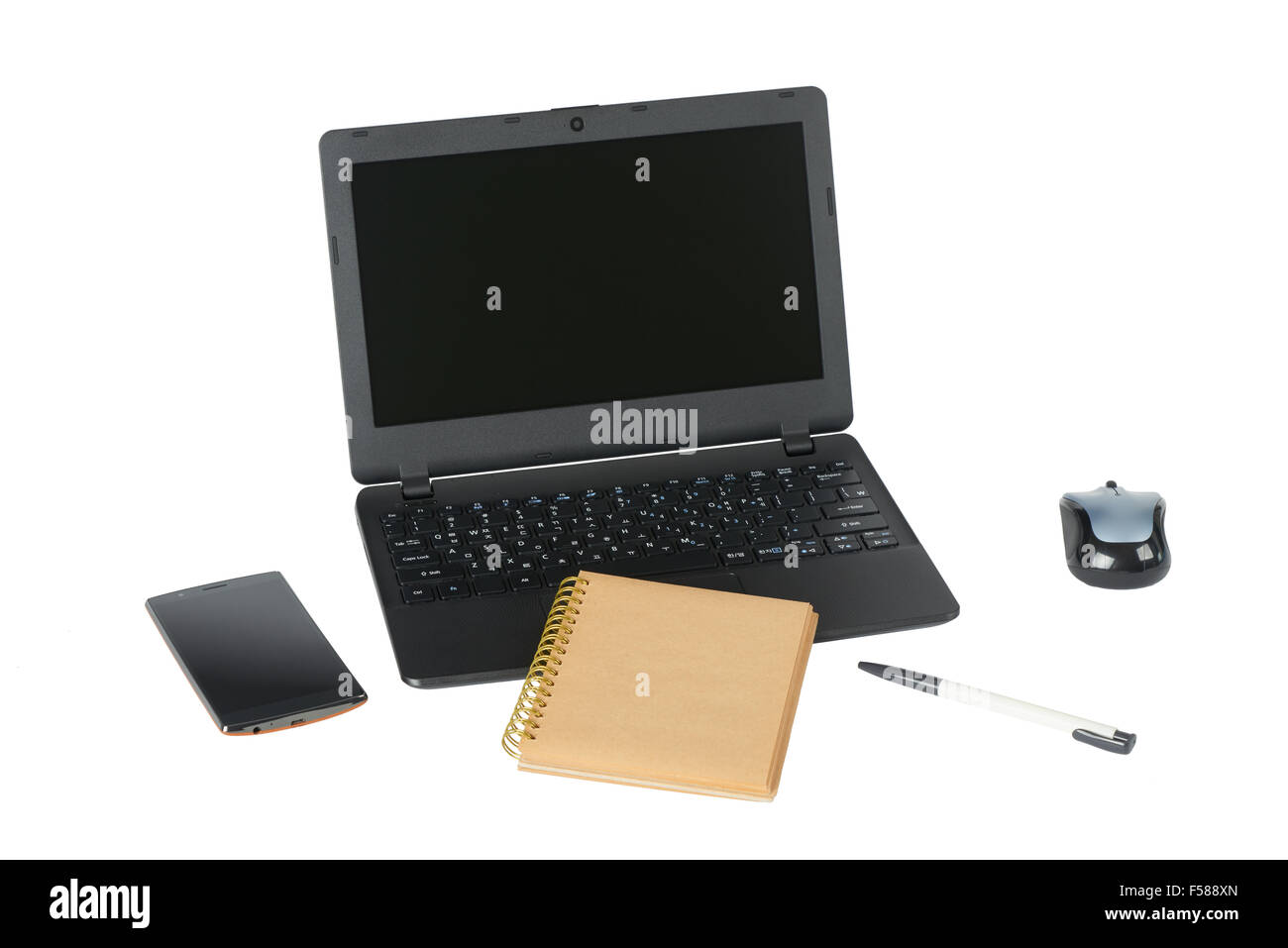 smartphone, laptop computer and memo note with ballpoint pen, isolated on white Stock Photo