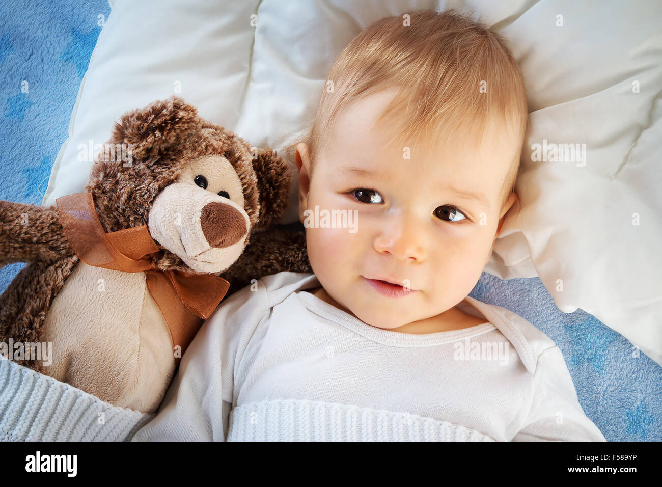 One year old baby with a teddy bear Stock Photo Alamy