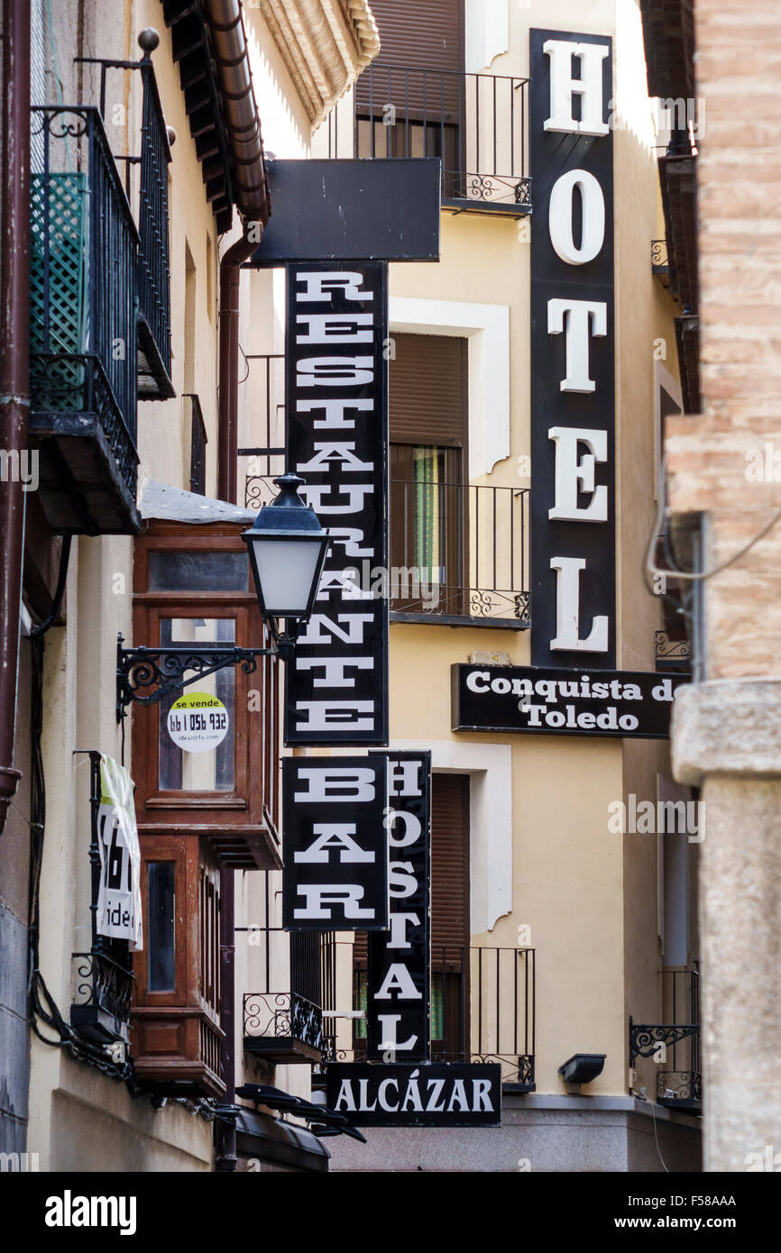 Toledo Spain,Europe,Spanish,Hispanic business signs,signage,hotel,restaurant restaurants food dining cafe cafes,building,exterior,narrow street,Spain1 Stock Photo