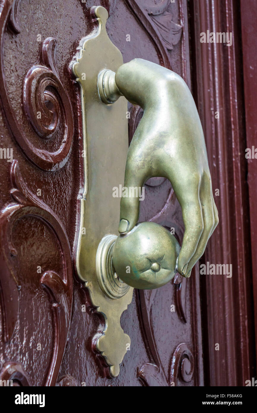 Toledo Spain,Europe,Spanish,Hispanic door handle,hand grabbing apple