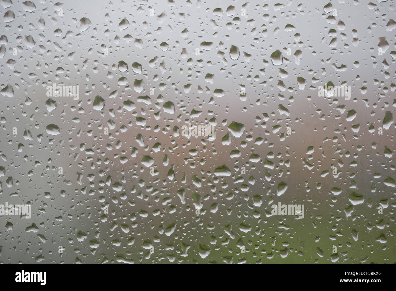 Glass surface with water drops in a rainy day Stock Photo - Alamy
