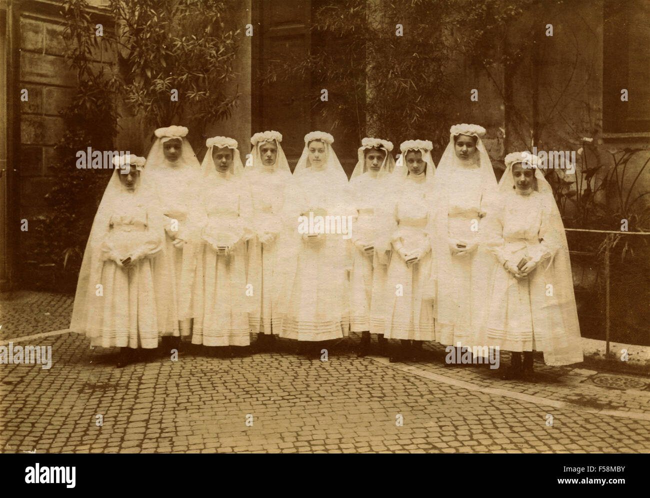Group of girls dressed for first communion hi-res stock photography and ...