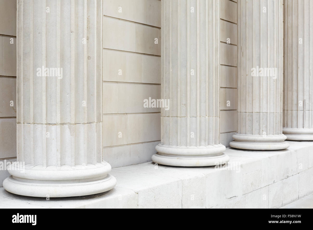 White classical columns and wall background Stock Photo