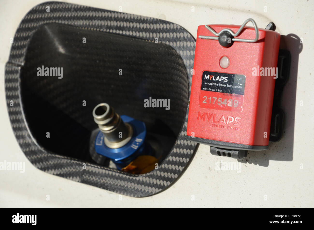 transponder for recording lap times and valve for air jack on BMW M235i