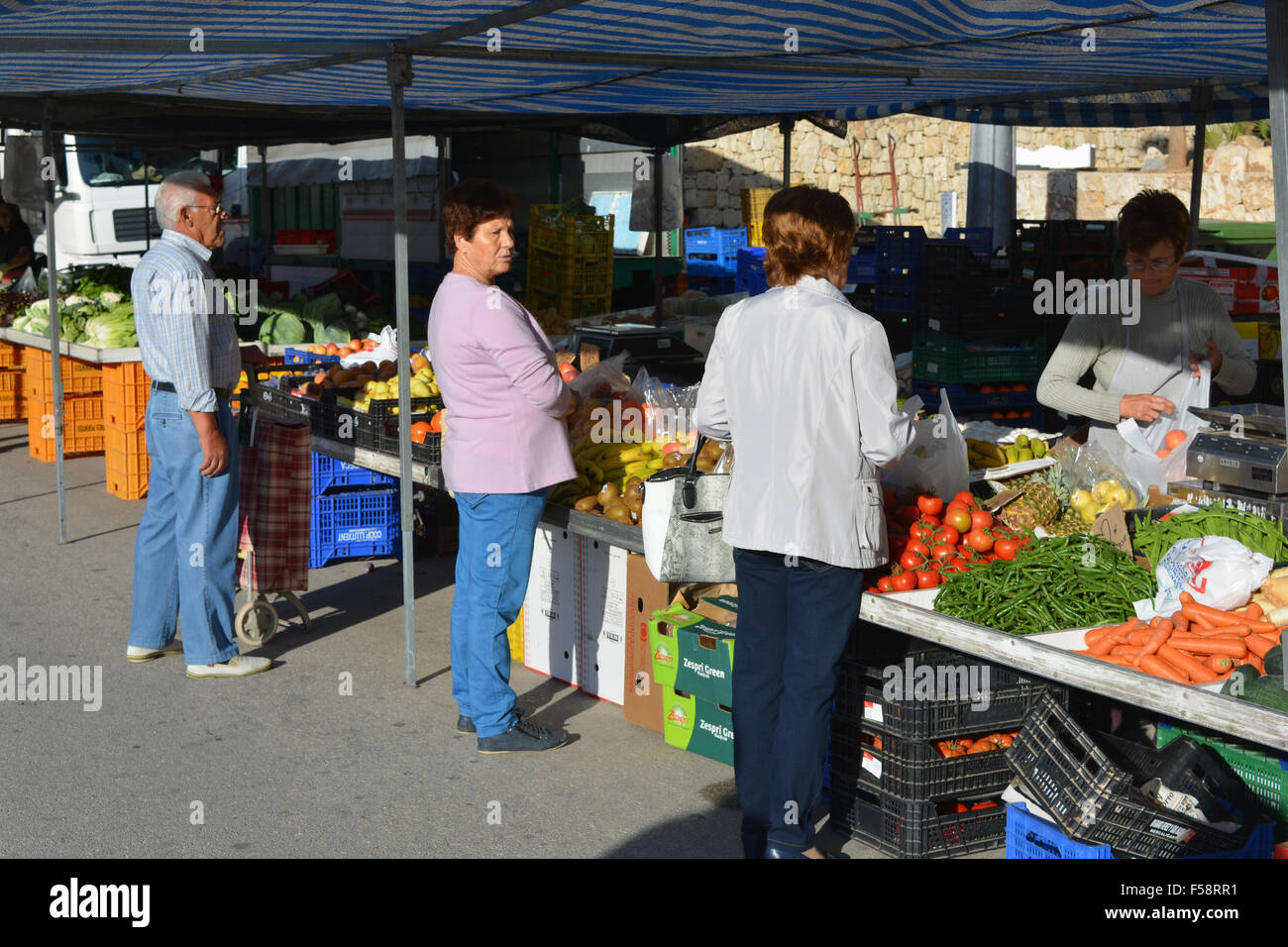 The weekly Thursday Market in Javea, Spain.  Stalls selling fresh fruit and vegetables. Stock Photo