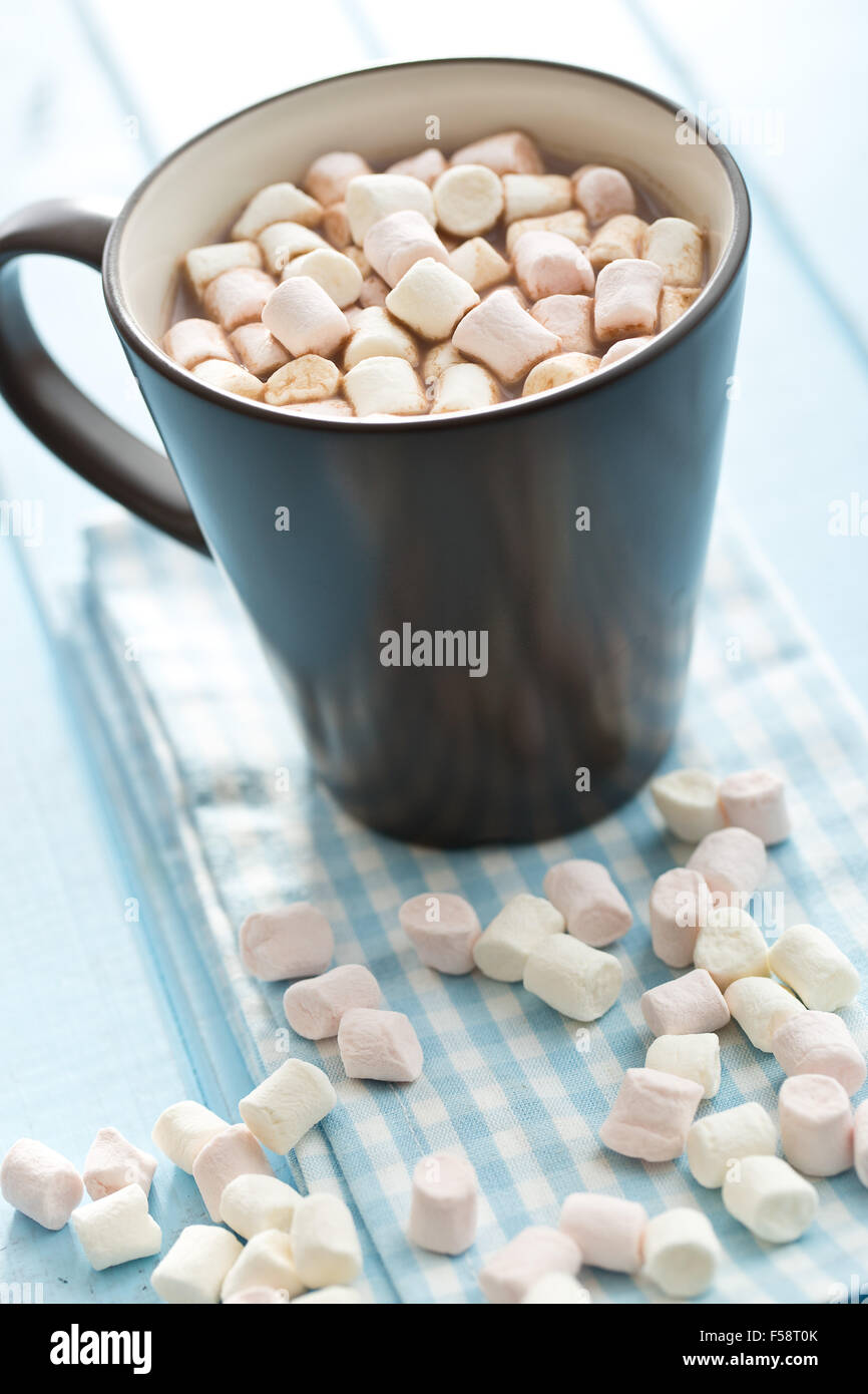Cocoa drink with marshmallows in mug on table Stock Photo Alamy