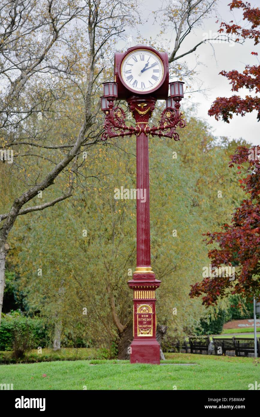 A fully restored four-dial miniature lamp post clock, donated by William G. Oswald to Victoria Park, Glasgow, Scotland in1888. Stock Photo