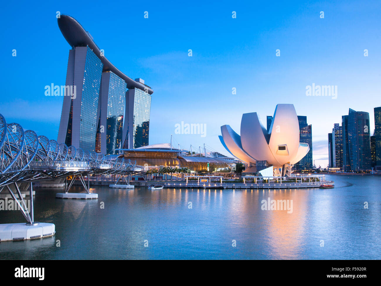 Singapore - July 10:  Marina Bay Sands Hotel, ArtScience Museum, Helix Bridge at July 10, 2013. Stock Photo