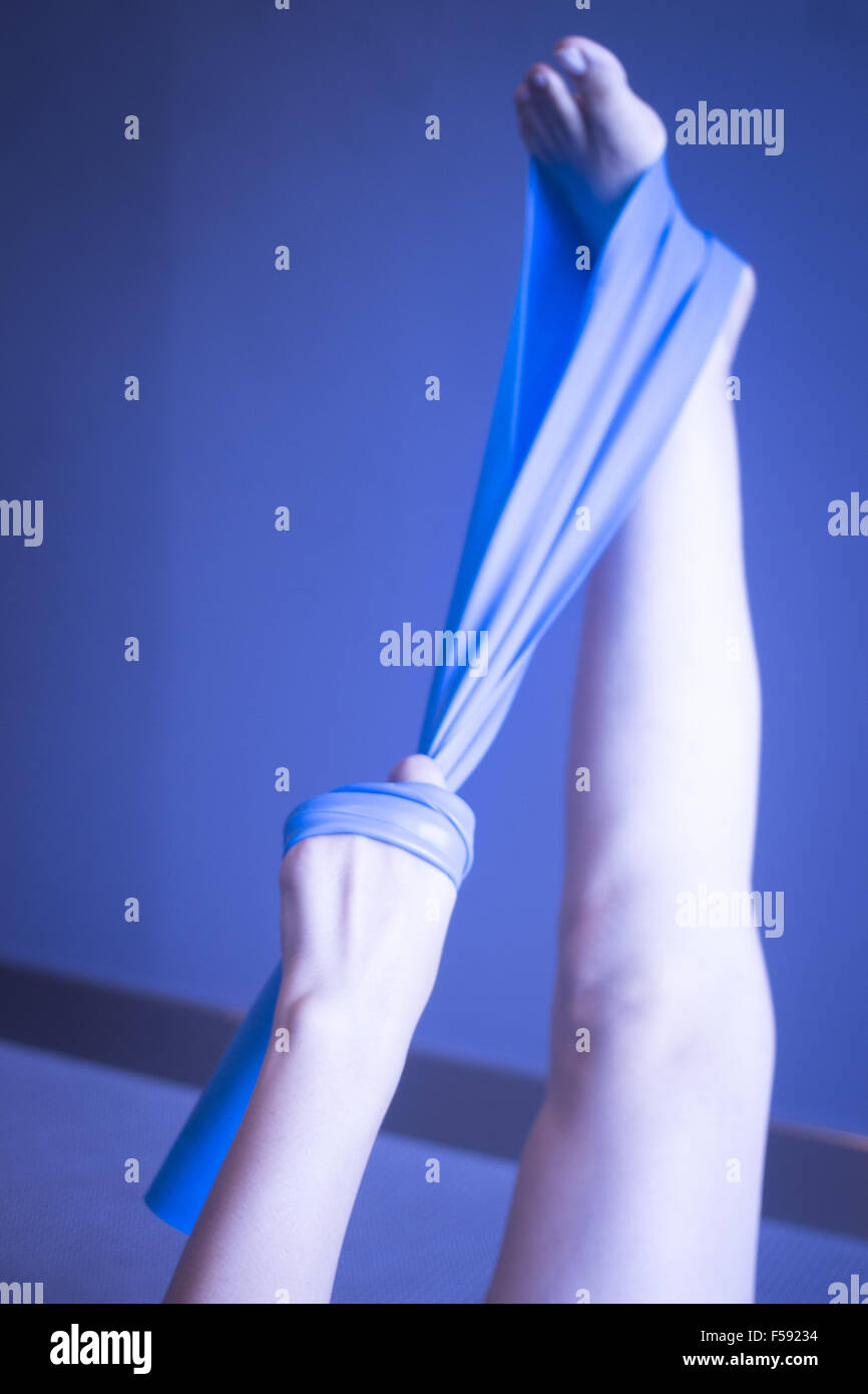 Pilates stretching leg hamstring foot achiles tendon yoga flexibility