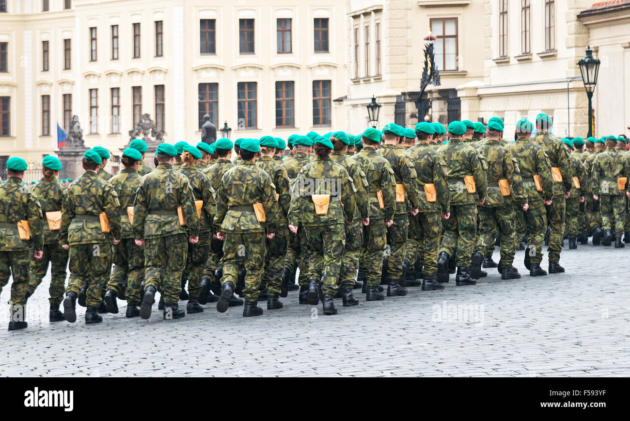 company of soldiers march on the stone road in the Prague Castle Stock Photo