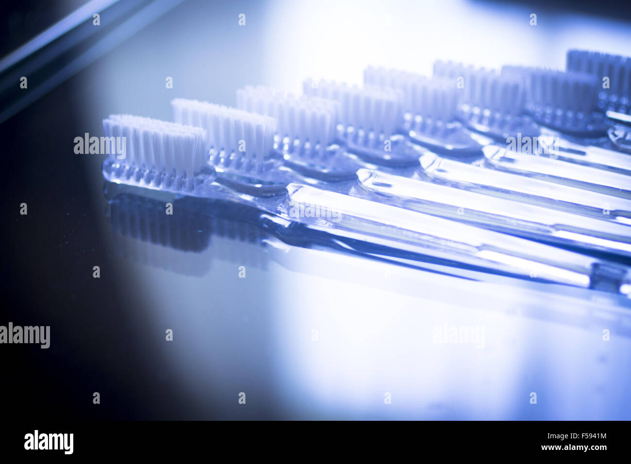 Toothbrushes on glass table dental hygiene plaque control in dentists
