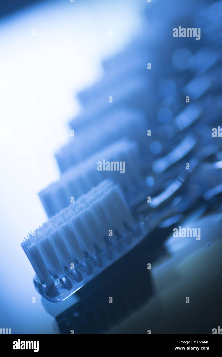 Toothbrushes on glass table dental hygiene plaque control in dentists