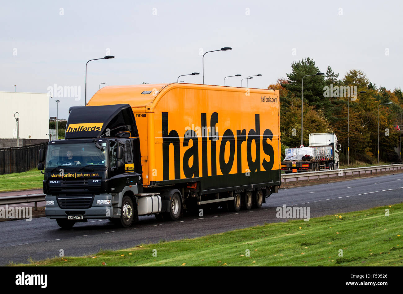 Halfords articulated lorry travelling along the Kingsway West dual carriageway in Dundee, UK Stock Photo