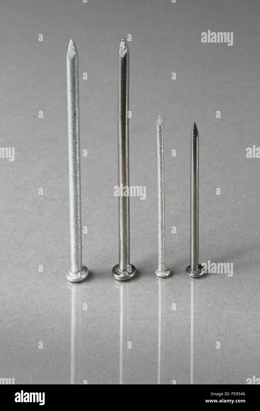 Steel nails in standard zinc coated hires stock photography and images