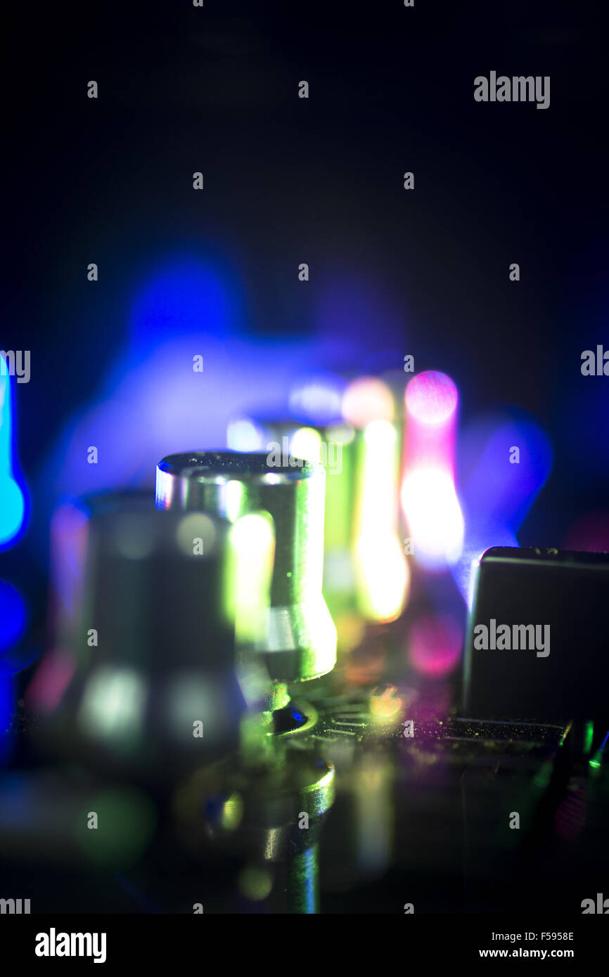 DJ console cd mp4 deejay mixing desk Ibiza house techno dance music wedding  reception party in nightclub with colored lighting effect disco lights  Stock Photo - Alamy
