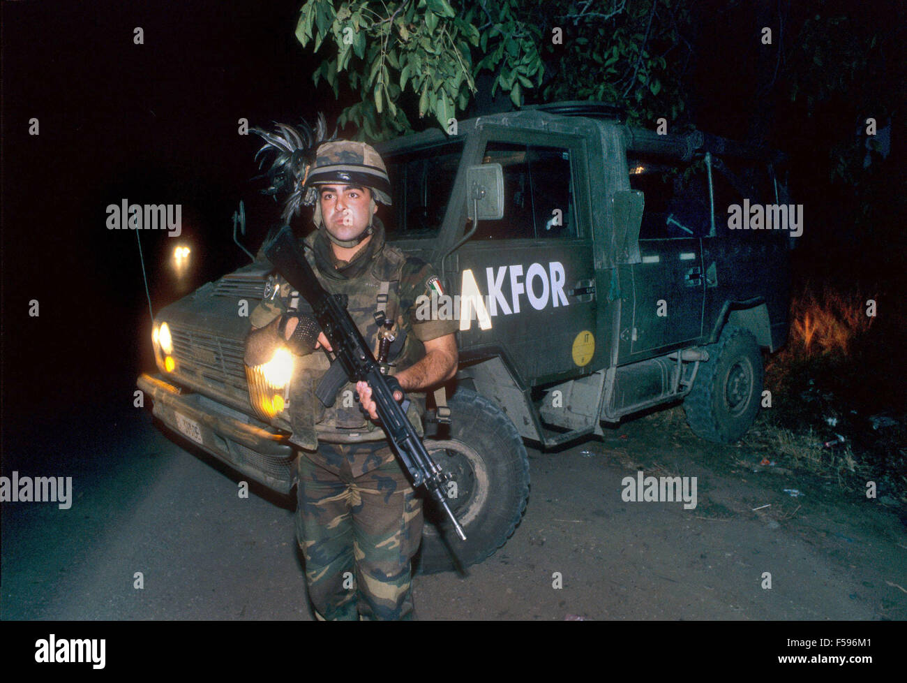 NATO intervention in Kosovo, July 2000, night patrol of Italian soldiers in support to international UN police Stock Photo