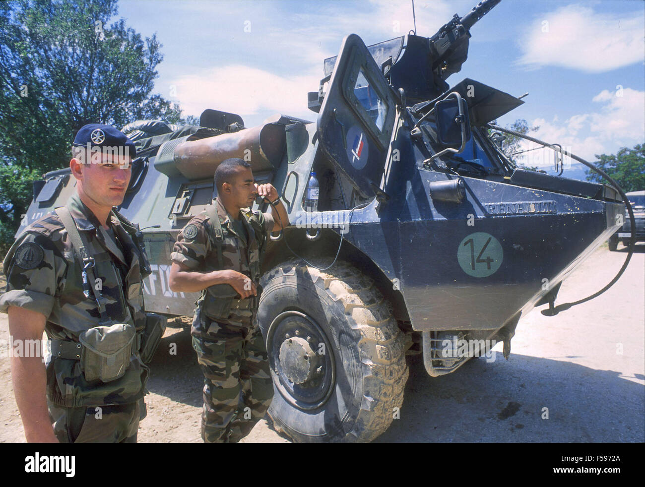 NATO intervention in Kosovo, July 2000, armored vehicle of the French army patrol Mitroviza town Stock Photo