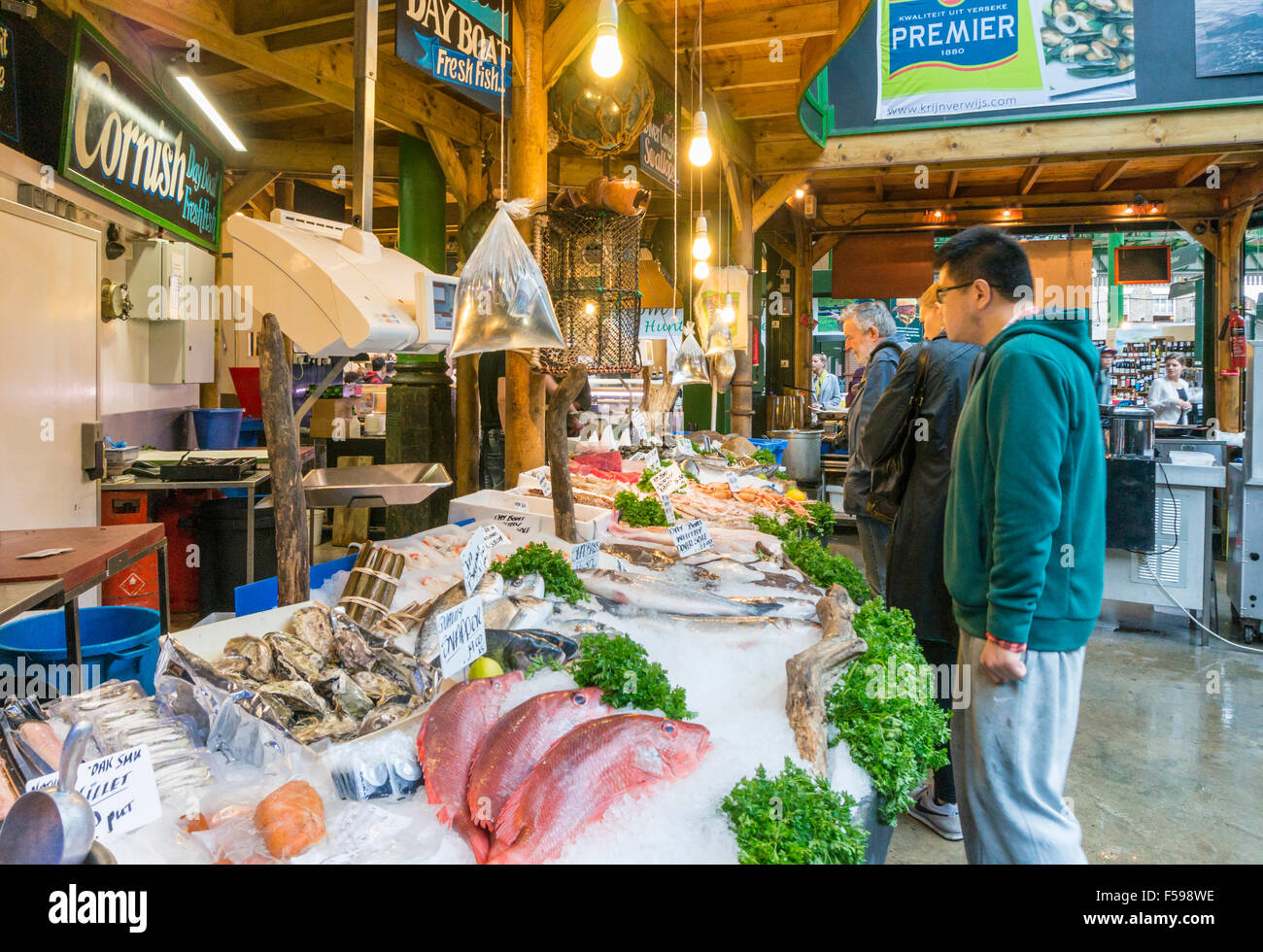 Fishmonger stall at Borough market selling fresh fish borough high street London England UK GB EU Europe Stock Photo