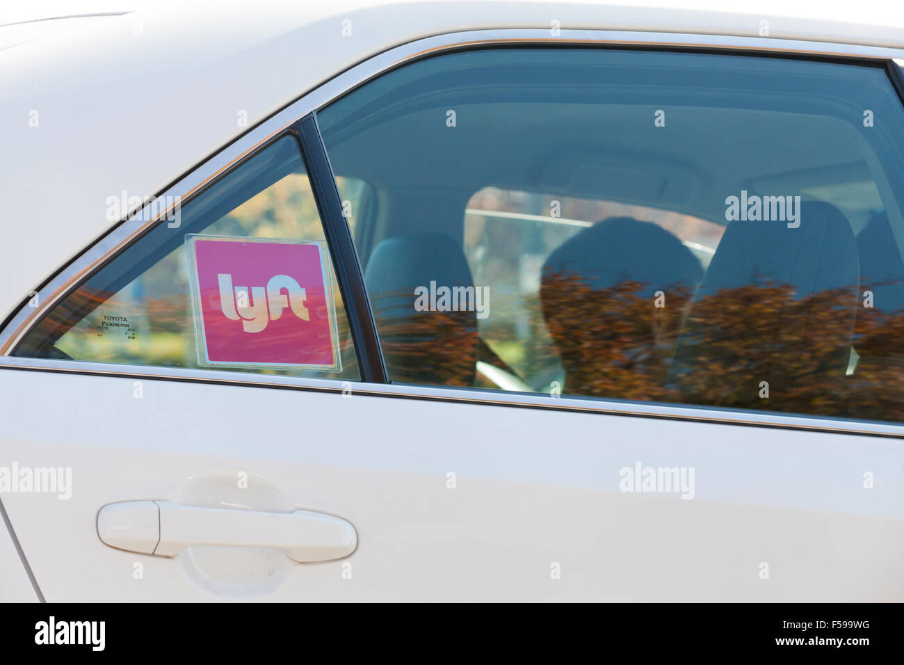 Lyft ridesharing sticker on car - Washington, DC USA Stock Photo