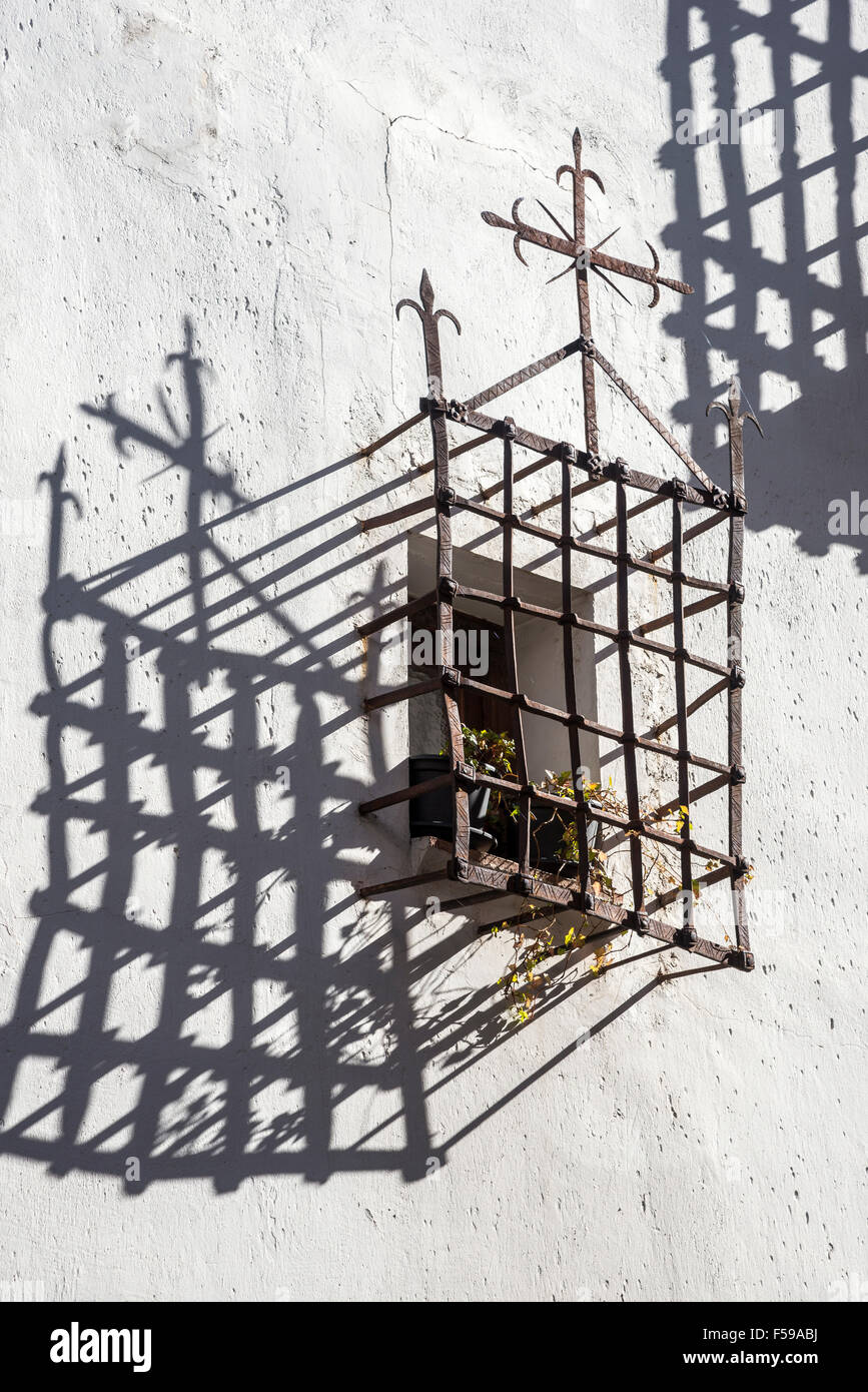 Ancient iron reja, window grill, in the old town of Cuenca in Castilla-La Mancha, Central Spain. Stock Photo