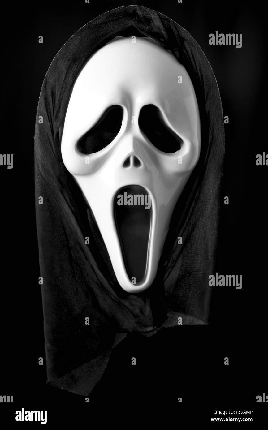 Scream Mask on a black background Stock Photo