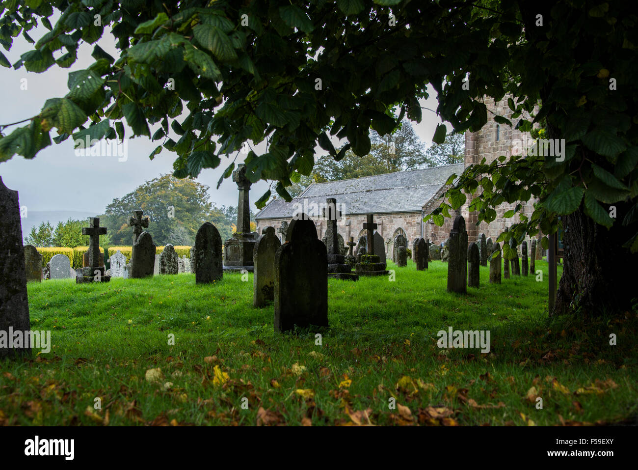 A rainy October day in Chagford near Dartmoor in Devon. The church of St Michael the Archangel and graveyard Stock Photo