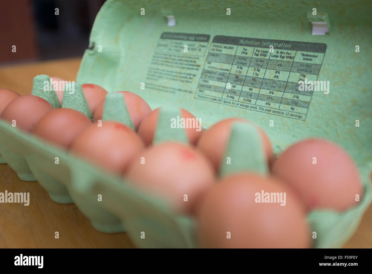 Carton of a dozen fresh eggs Stock Photo Alamy