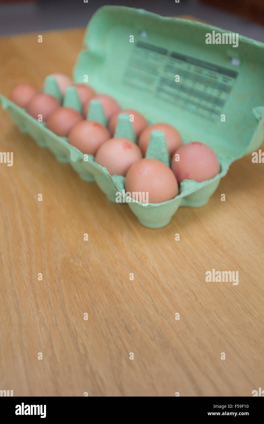 Carton of a dozen fresh eggs Stock Photo Alamy