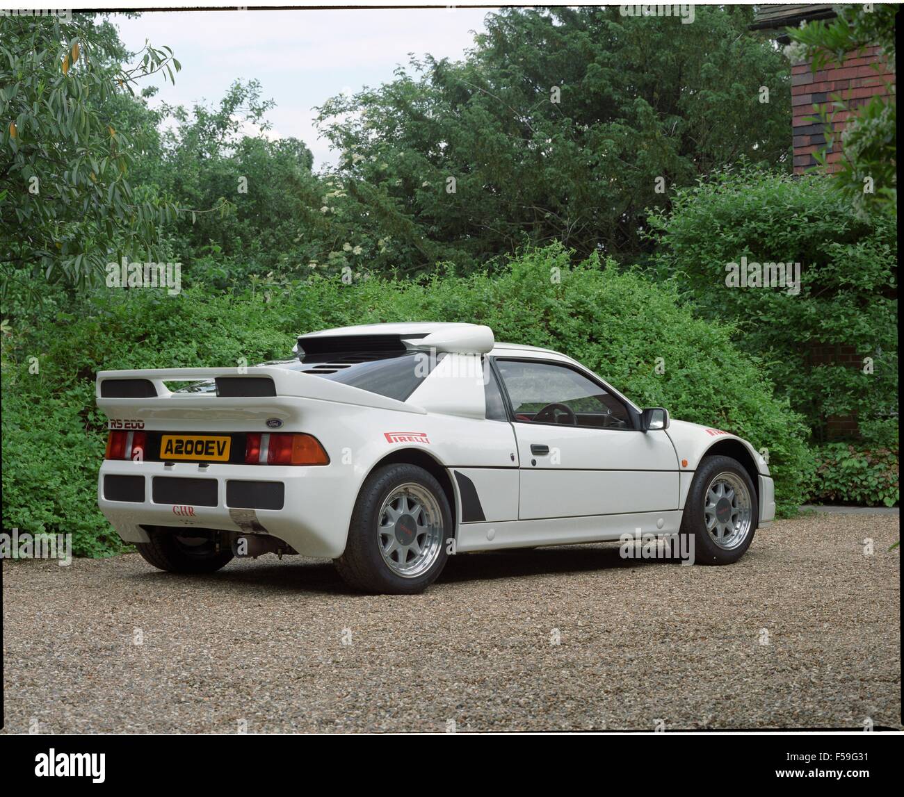 Ford RS200 / RS 200 Road Car in diamond white - mid engined sports car 1980s - showing side and rear Stock Photo