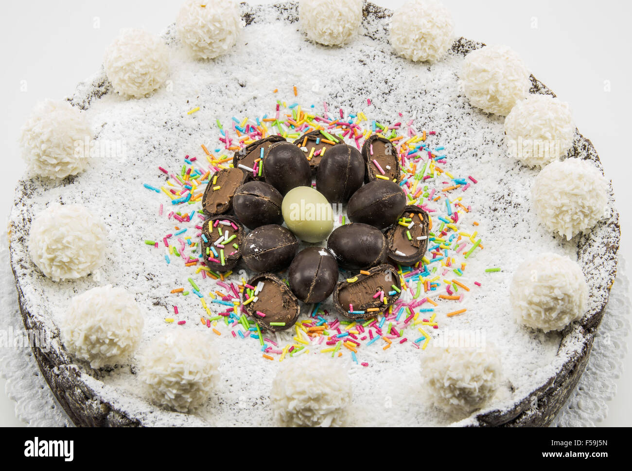 Easter cake with ricotta and chocolate decorated with chocolate eggs