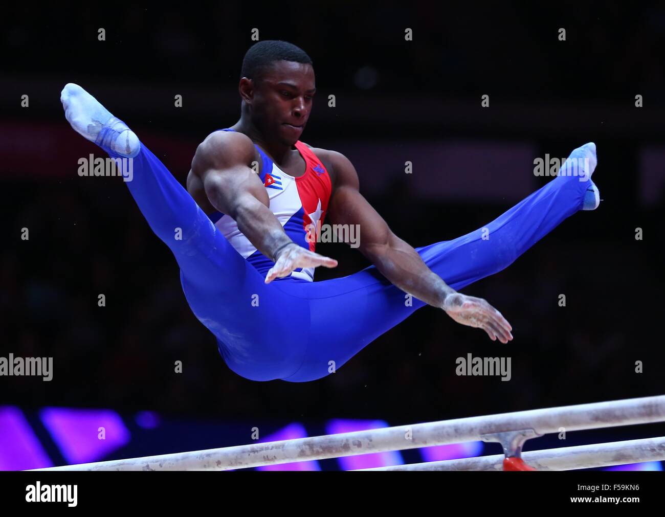 Glasgow, Scotland. 30th Oct, 2015. Manrique Larduet of Cuba competes on the parallel bars during the men's All-Around final at the 46th World Artistic Gymnastics Championships in Glasgow, Scotland, Great Britain on Oct. 30, 2015. Manrique Larduet took the sivler medal of the event with a score of 90.698 points. Credit:  Gong Bing/Xinhua/Alamy Live News Stock Photo