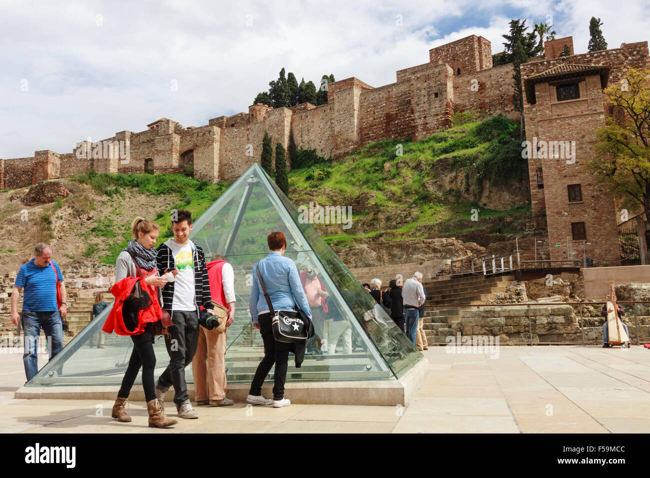 Malaga, Spain. People next to Alcazaba moorish castle. Stock Photo