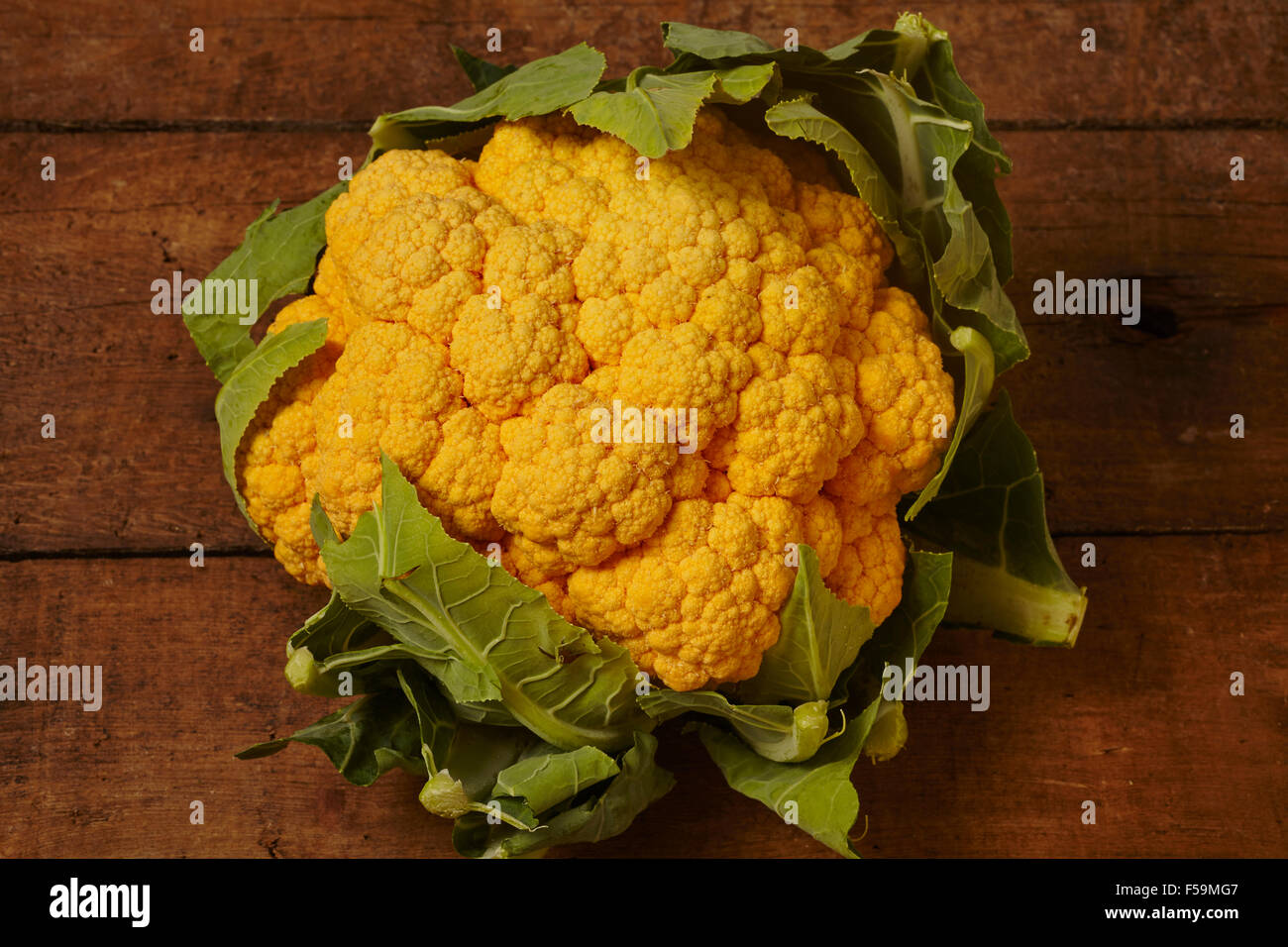 a whole head of golden cauliflower Stock Photo