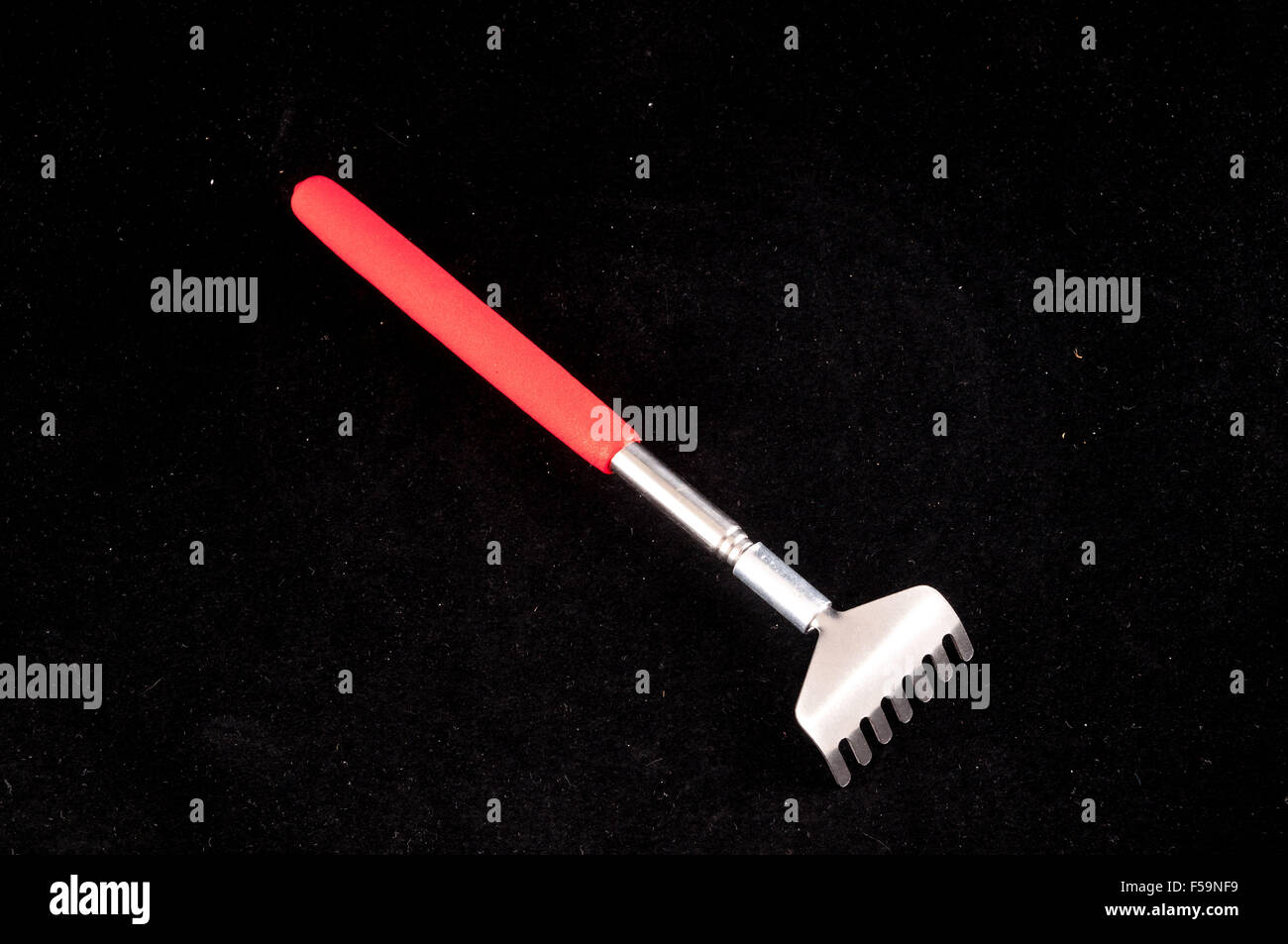 Matallic Rake Back scratcher hi-res stock photography and images - Alamy