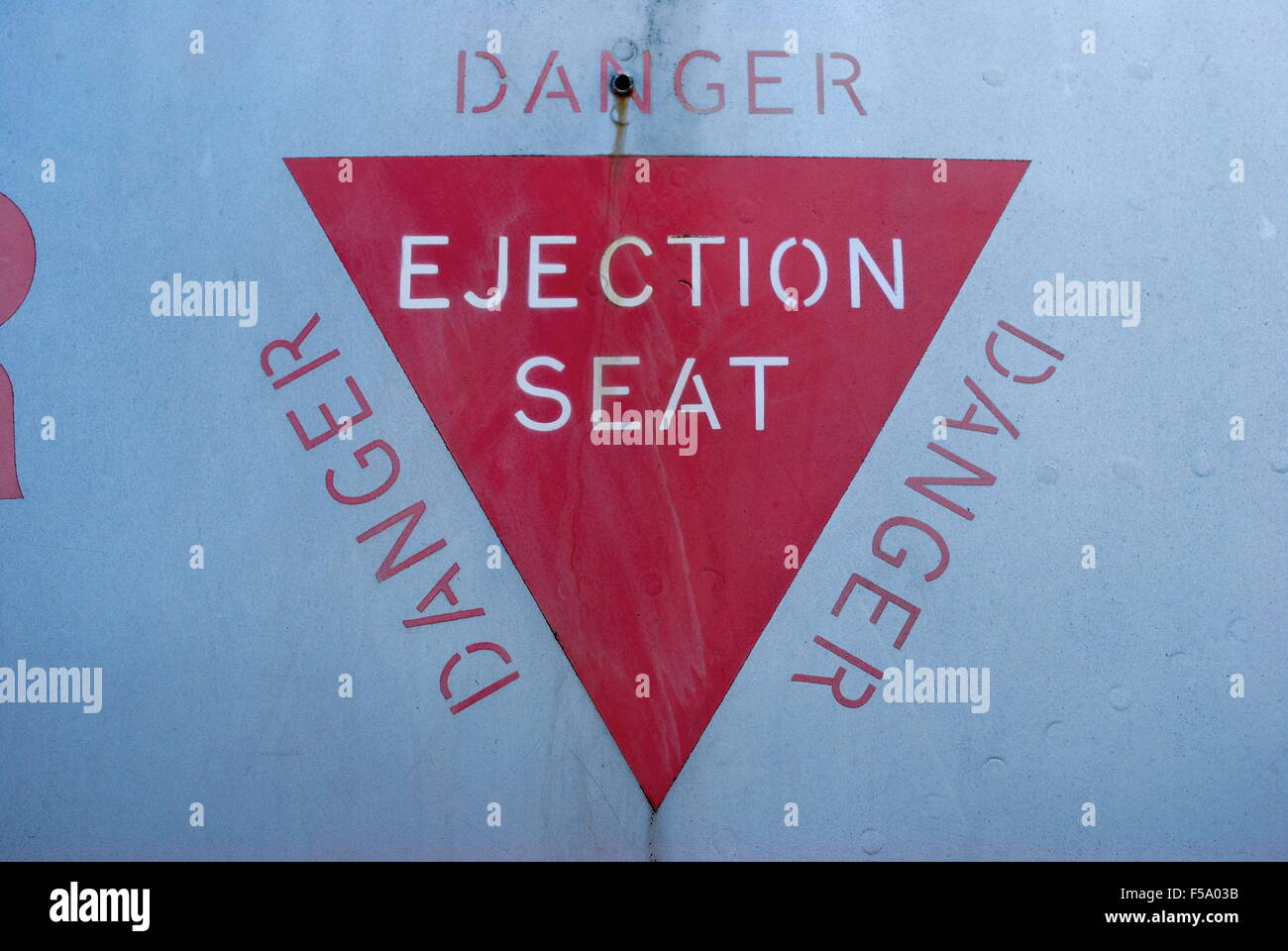 Danger ejection Seat sign on airplane Stock Photo