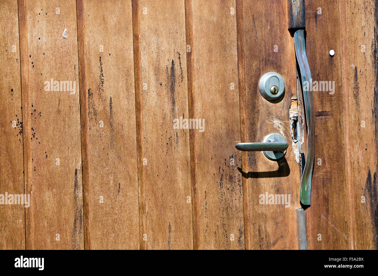 Picture of broken door lock after burglars have their fun, from the North of Sweden. Stock Photo