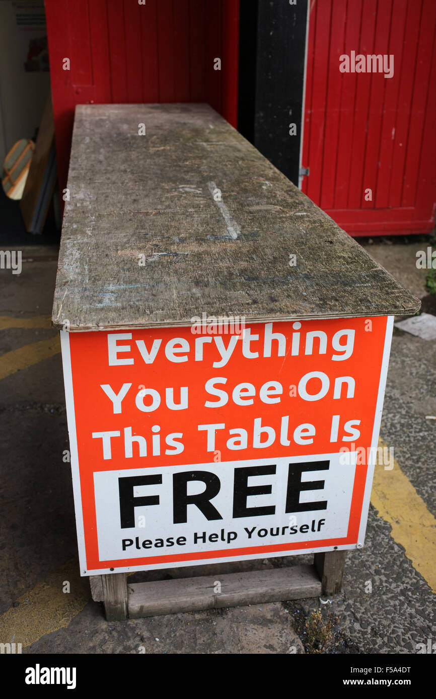 Everything you see on this table is free sign Second hand shop