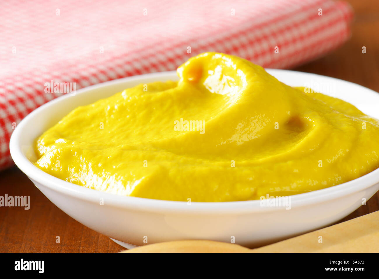 Bowl of American yellow mustard Stock Photo Alamy