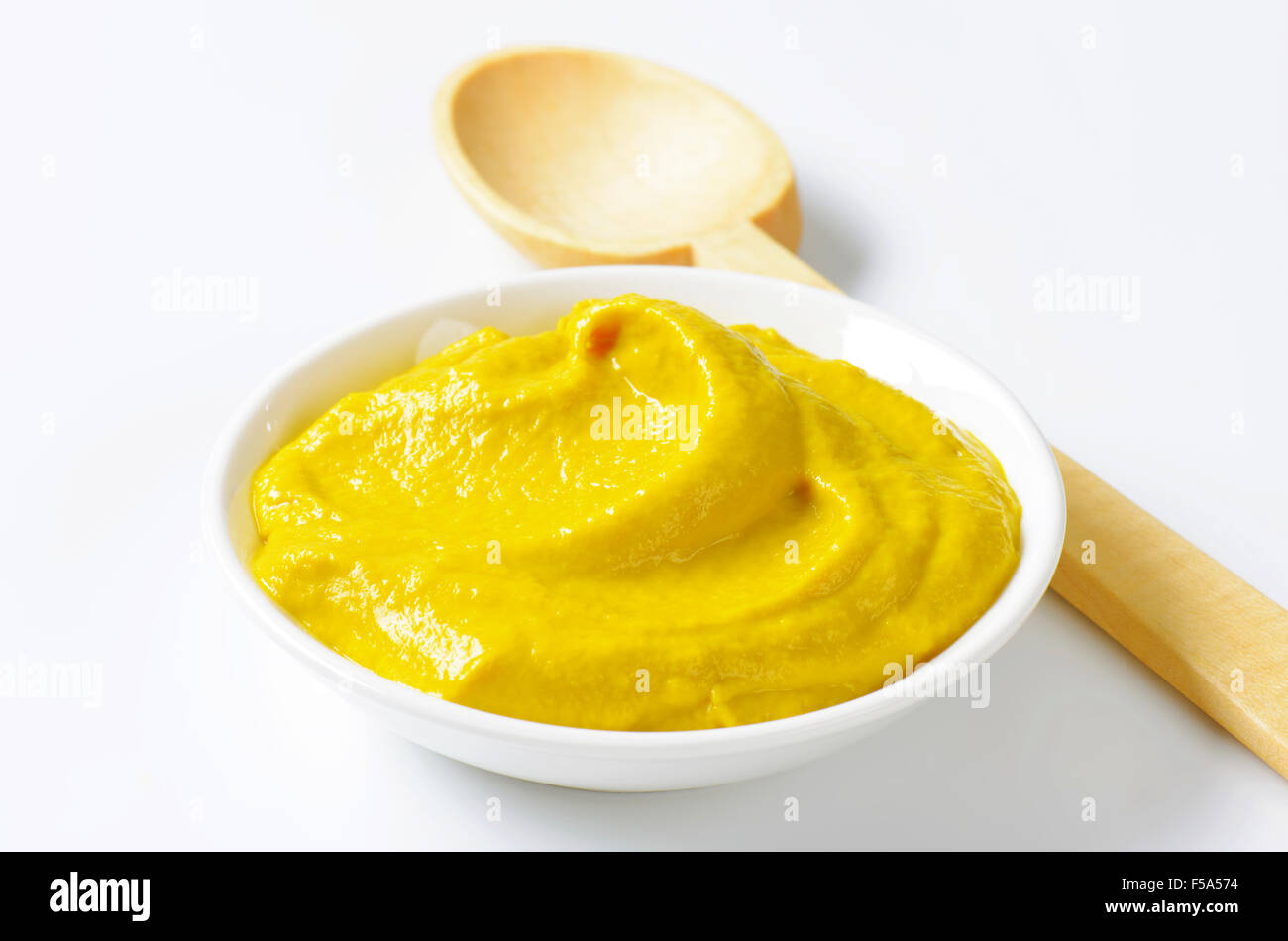 Bowl of American yellow mustard Stock Photo Alamy