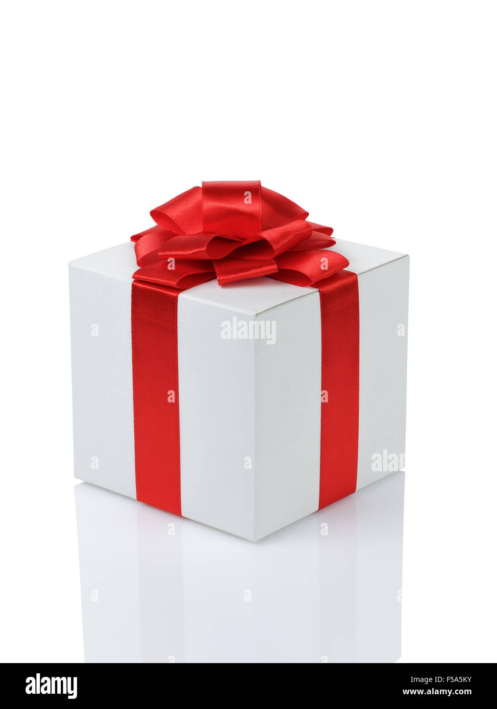 white paper gift box with red ribbon bow isolated Stock Photo
