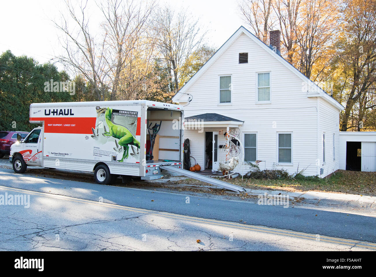 Moving house,home, with moving truck, moving van. Stock Photo