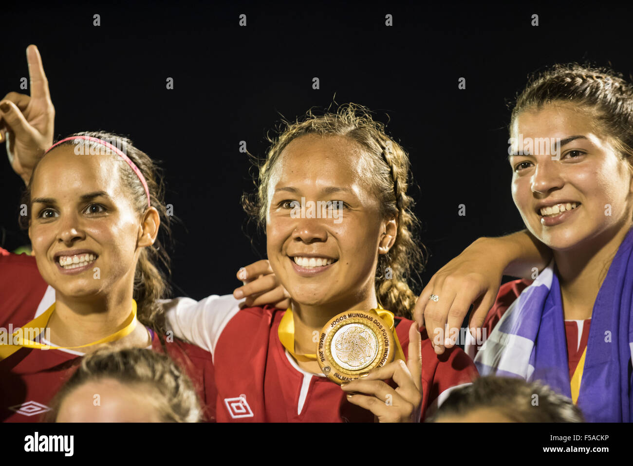 Palmas, Brazil. 30th October, 2015. The USA indigenous women's team celebrate after winning the final against the local Xerente tribe at the International Indigenous Games in the city of Palmas, Tocantins State, Brazil. The USA won on a penalty shoot-out after a 0-0 match. Credit:  Sue Cunningham Photographic/Alamy Live News Stock Photo