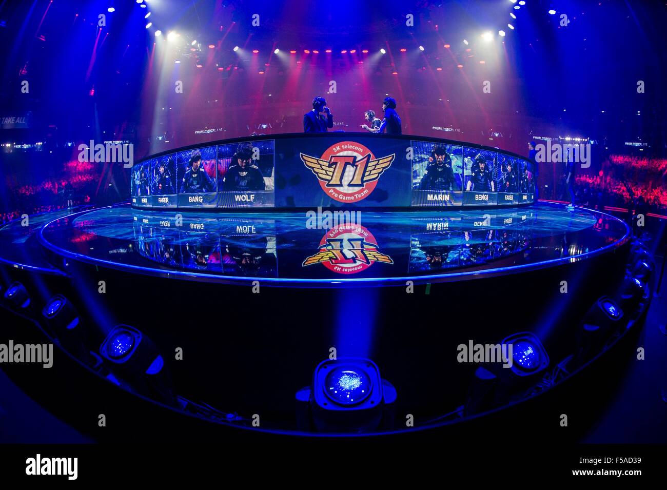 Berlin, Germany. 31st Oct, 2015. Photos of players can be seen during the world championship finale of the computer game 'League of Legends' in the Mercedes Benz Arena in Berlin, Germany, 31 October 2015. Two teams of five play for domination on a map studded with towers and monsters. Photo: PAUL ZINKEN/dpa/Alamy Live News Stock Photo