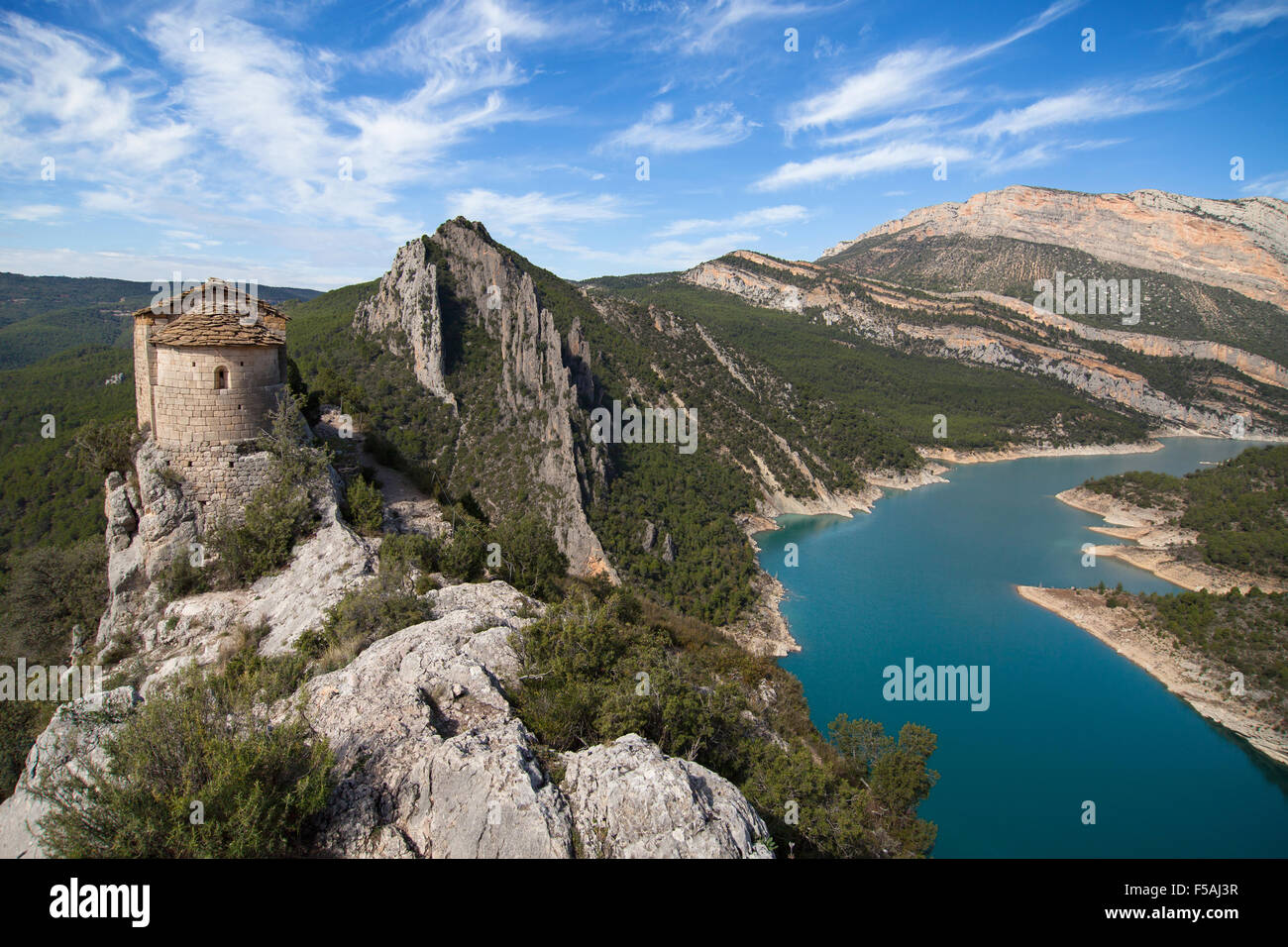 Hermitage of La Pertusa and the Montsec mountains in La Noguera, Lleida, Catalonia. Stock Photo